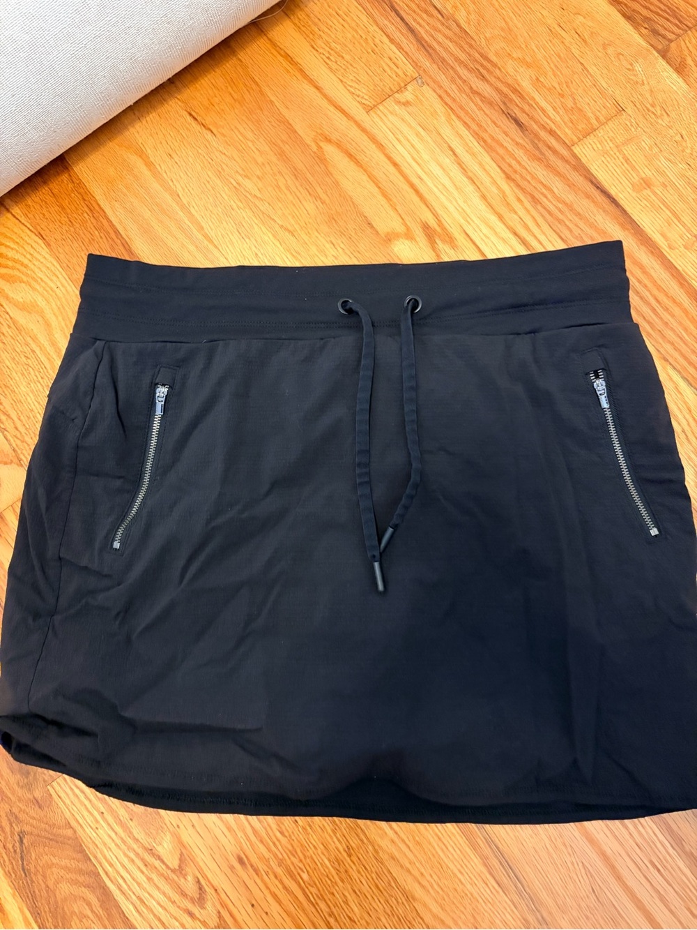 Athleta Black Drawstring Active Skirt with Zip Pockets